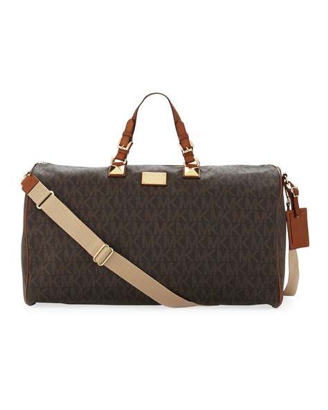 men's michael kors duffle bag|Michael Kors large suitcase.